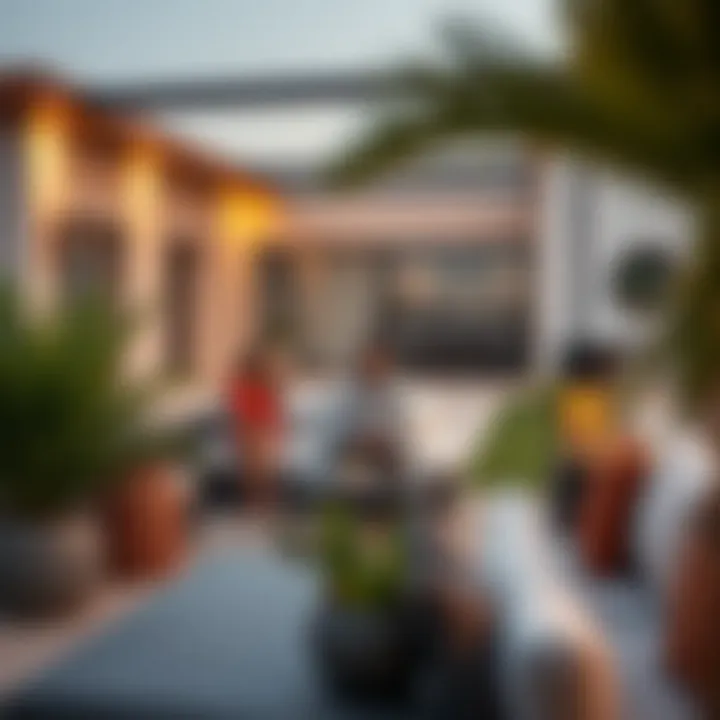 Family Enjoying Outdoor Space in Abu Hail Family enjoying the outdoor space of a villa